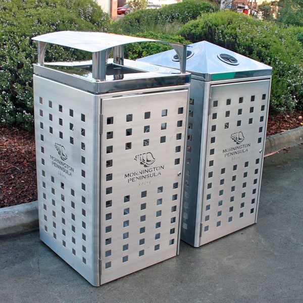 Laser cut logos on garbage bin enclosure
