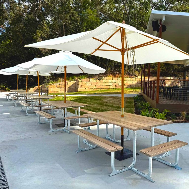 Large Outdoor table Setting with Aluminium Battens that have a timber appearance at Hillsong