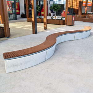 3 x Wandin curved benches mounted on a concrete plinth