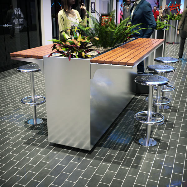 Planter with table in shopping centre