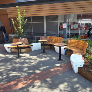 Timber and concrete modular seat at Manor Lakes Shopping Centre