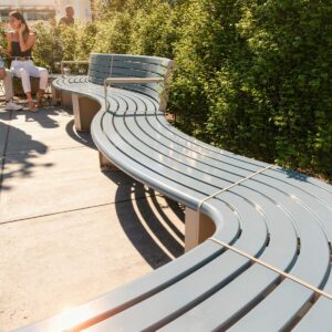 Modular Curved Public Seating set against a garden bed