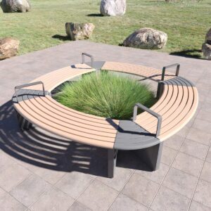 Modular Commercial Outdoor Bench in a circular configuration, surrounding a garden with grasses with large boulders spaced apart in the background